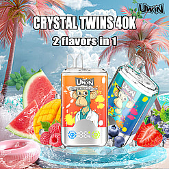 Promotional image showcasing Uwin Crystal Twins 40K vaping devices with two flavors, watermelon mango and blueberry strawberry, styled with tropical beach elements and graphics featuring a cartoon chimpanzee character.
