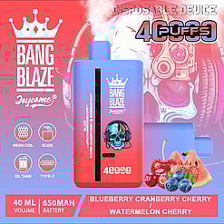 Promotional image of Bang Blaze Joycome disposable vape device featuring a skull design with headphones, offering 4000 puffs and flavors like Blueberry Cranberry Cherry and Watermelon Cherry, displayed with related fruit graphics.