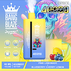 Promotional image showcasing the Bang Blaze Joycome disposable vaping device with a vibrant yellow-blue gradient design, accompanied by a colorful abstract artwork, a lemon, blueberries, cherries, and product details including 4000 puffs, 40ml volume, and 650mAh battery.