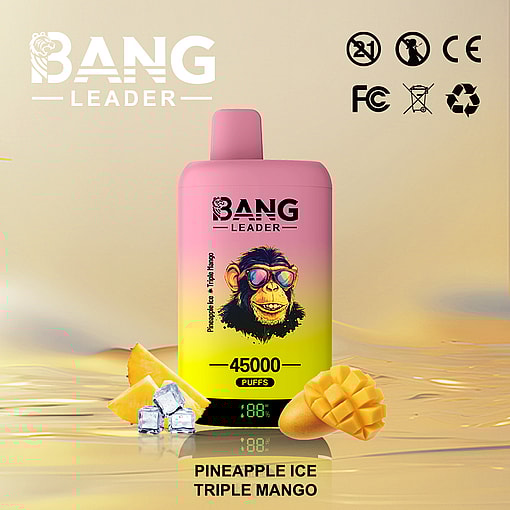 Promotional image of a Bang Leader vape device featuring 45000 puffs in Pineapple Ice Triple Mango flavor, with a playful chimp illustration, surrounded by mango slices, pineapple chunks, and ice cubes on a reflective golden surface.